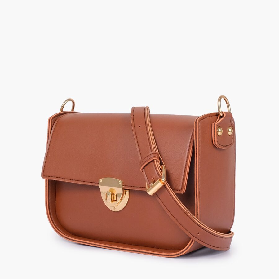 Brown saddle bag with twist lock | Studio Nafay